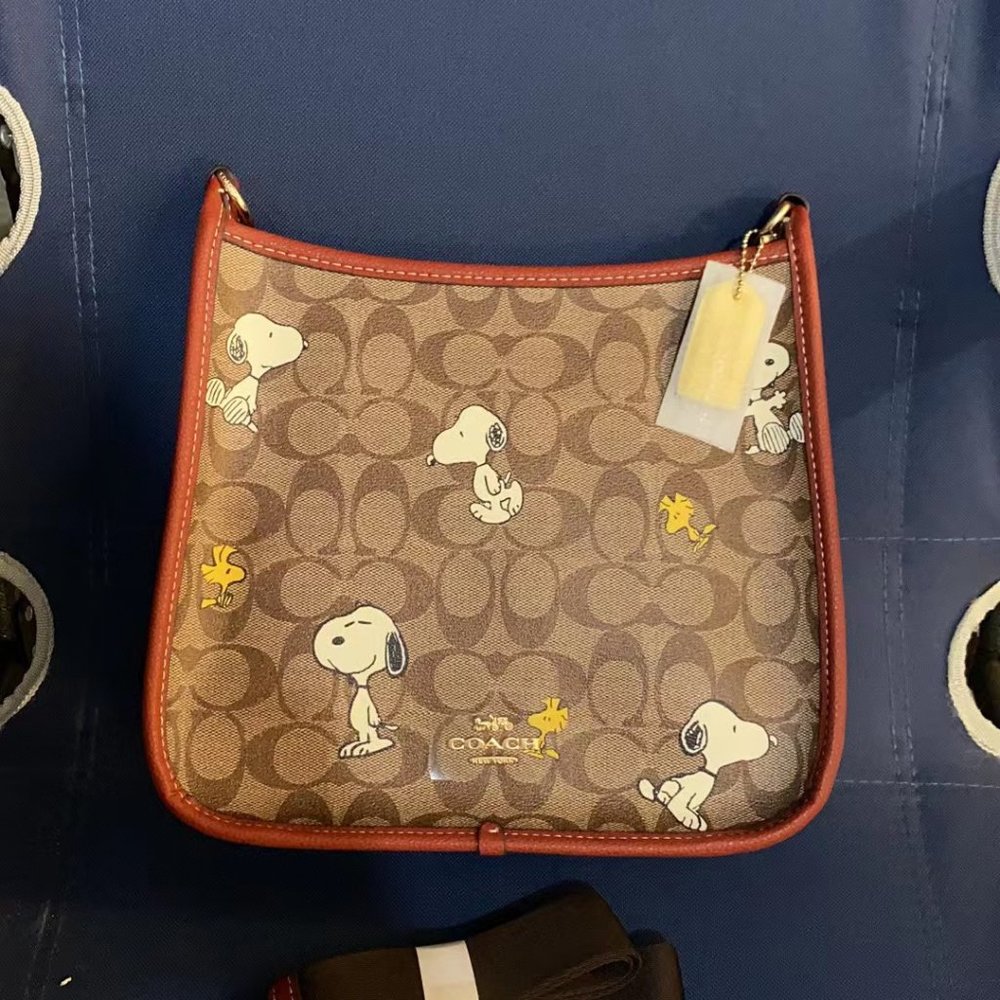 Coach X Peanuts Dempsey File Bag Signature Canvas With Snoopy Woodstock Print